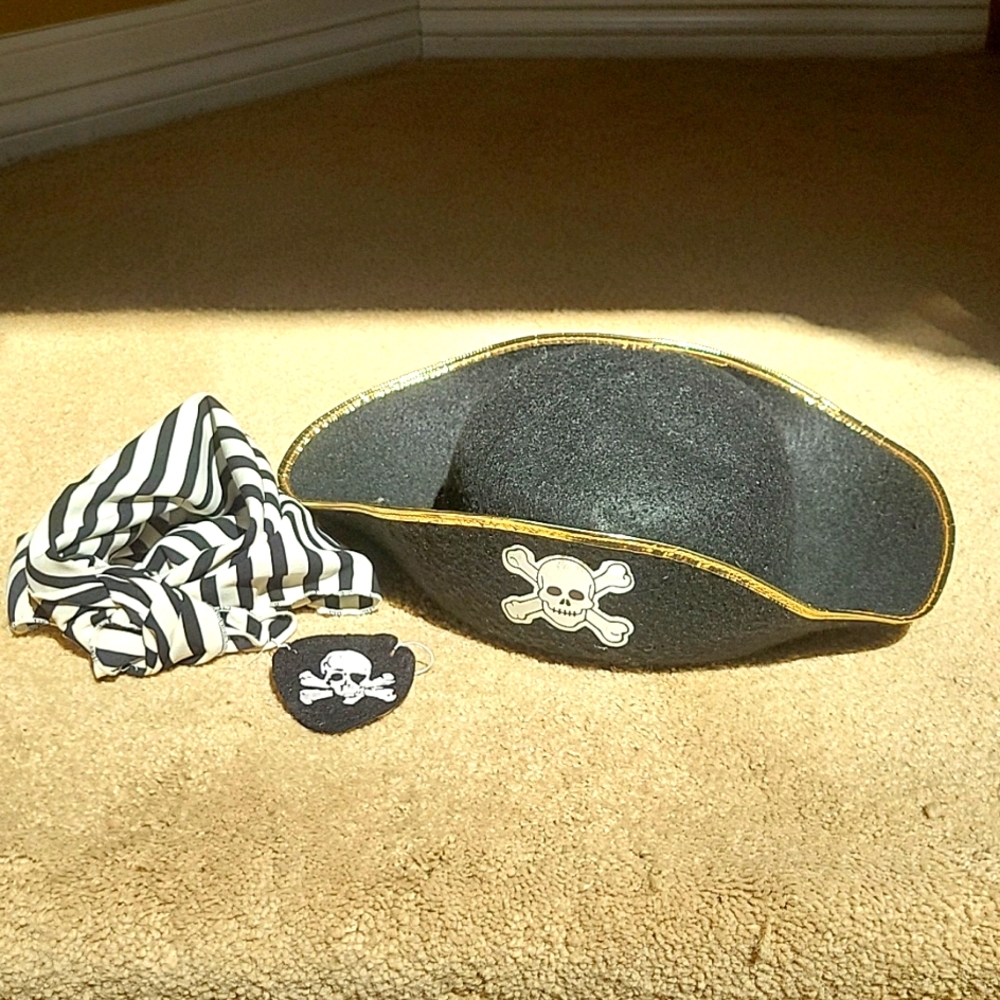 Pirate skull and bones hat, neck tie, and skull & bones eye patch. Kids Costume